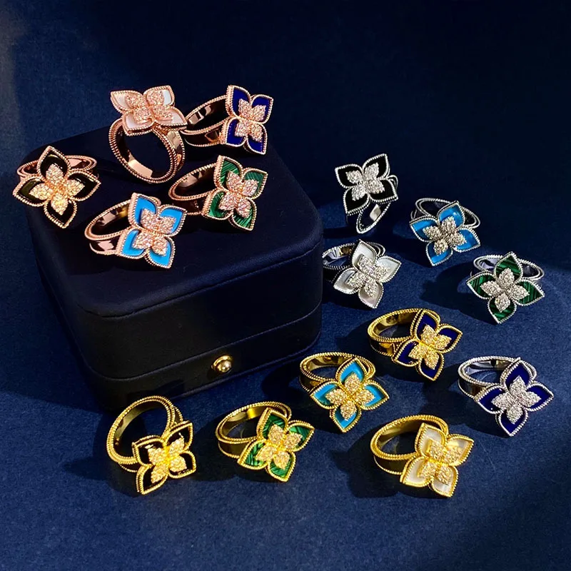 

New diamond shaped four petal flower ring Diamond studded turquoise ring Fashion internet celebrity trendy 2025 Fashion