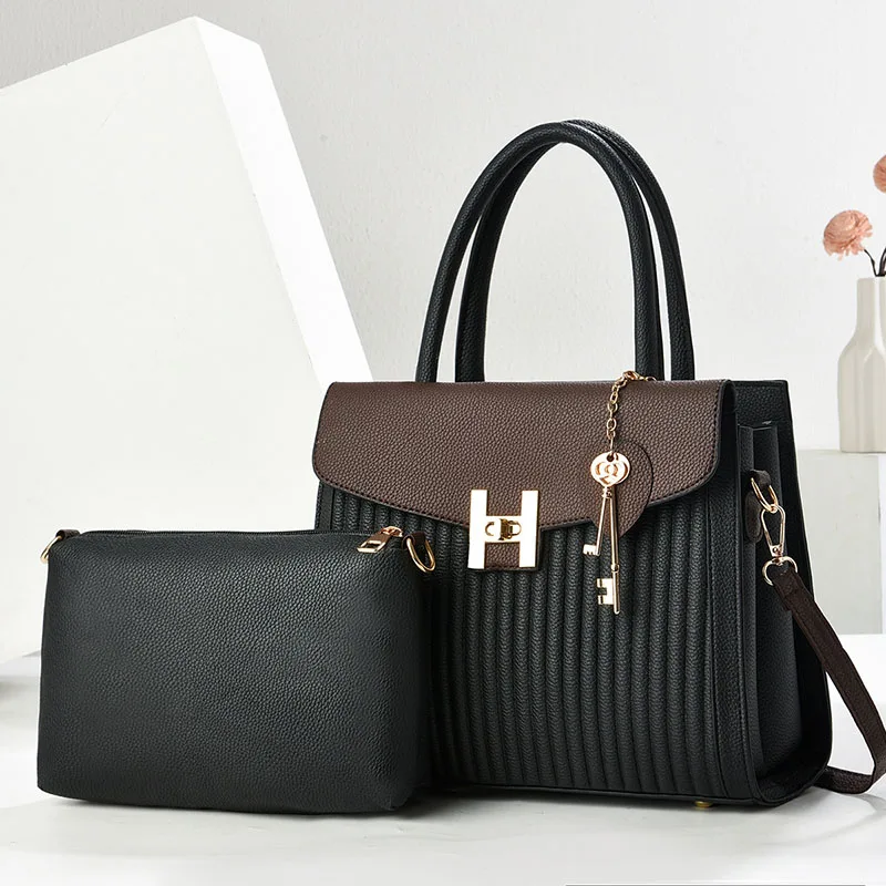 Large tote worn on shoulder in urban setting