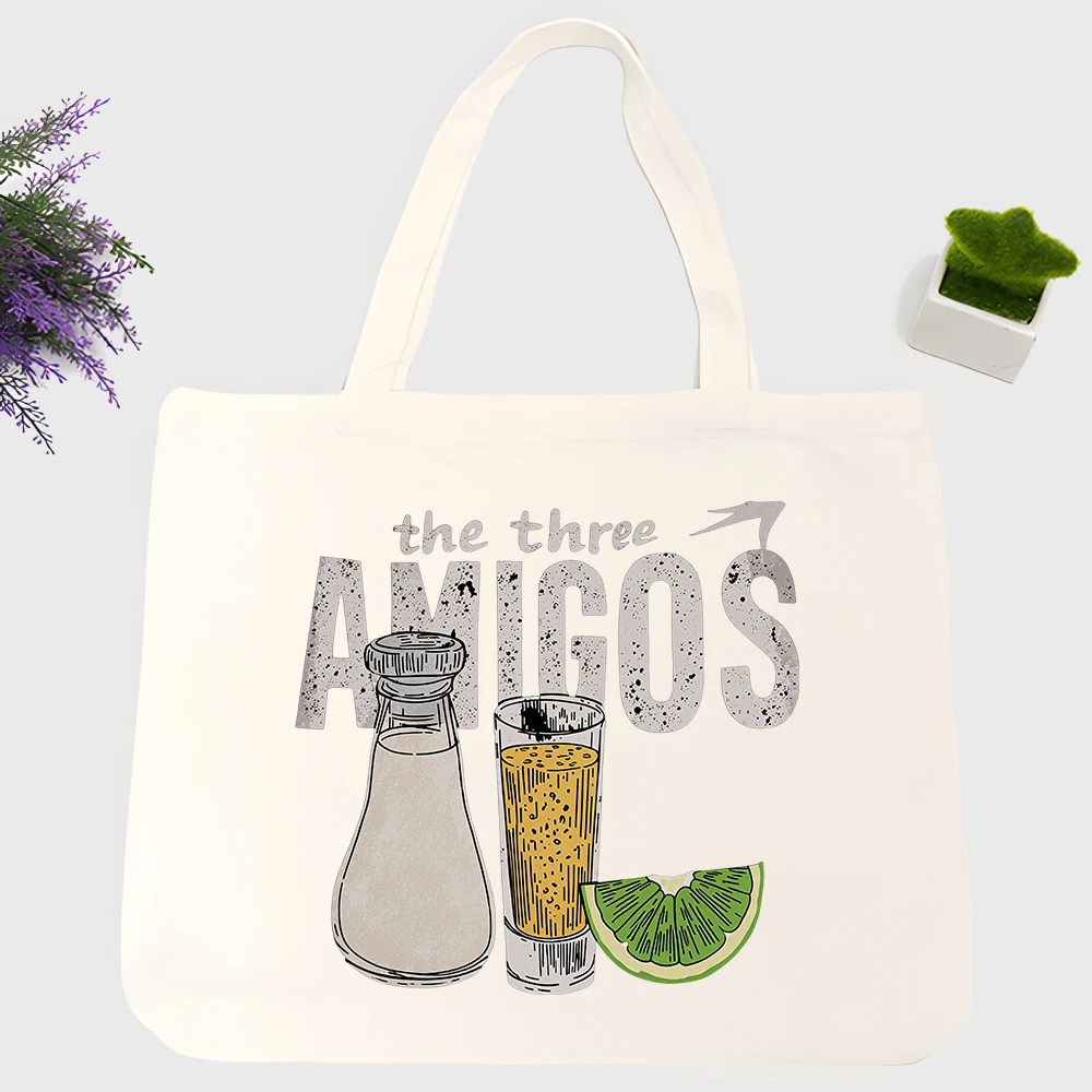Men's lime and drink graphic canvas tote bag with typography print, ideal for casual summer outings and daily shopping