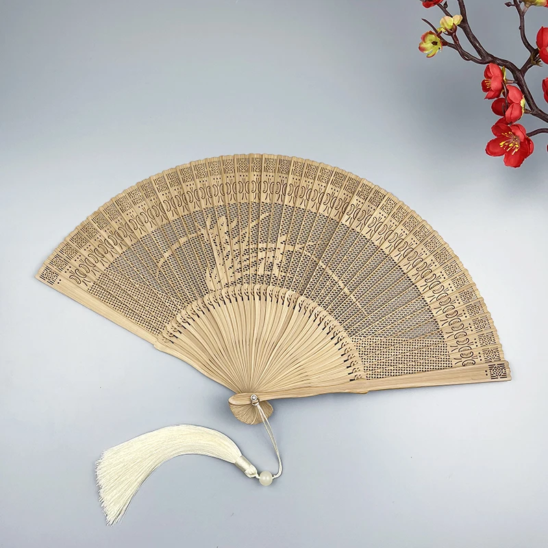 The product can be customized.Chinese style whole bamboo fan carved openwork retro style men's and women's craft folding fan cla