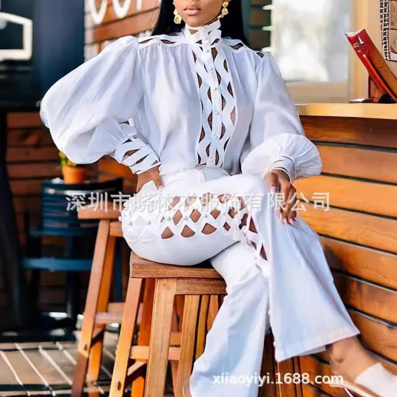 

2025 новые модные женские однотонные белые комплекты из 2 предметов, повседневные полые рубашки с длинными рукавами, винтажные брюки, женская модная одежда