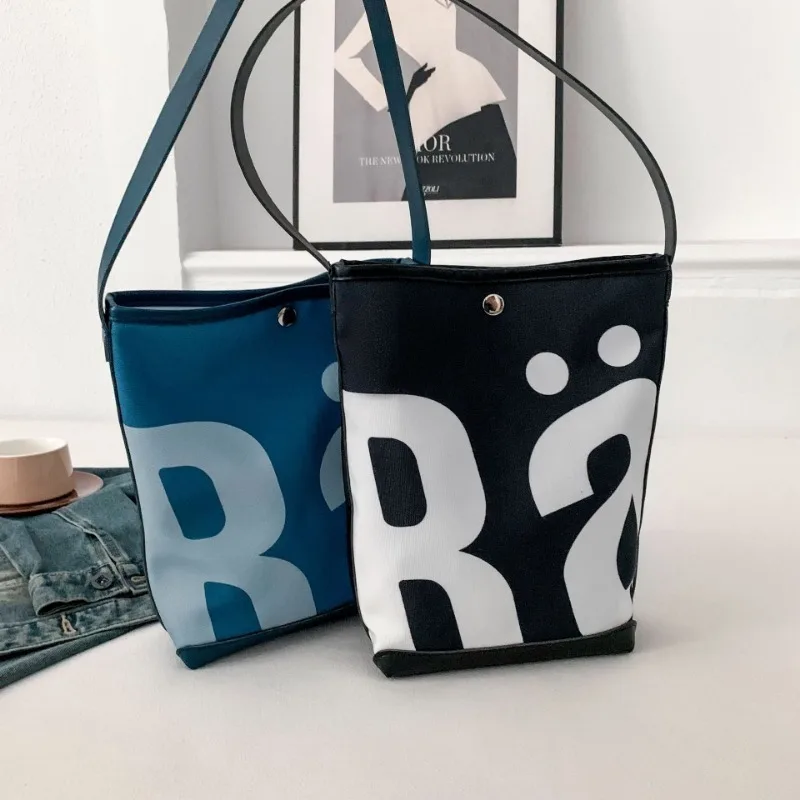 

New niche bucket storage bag for women, trendy large capacity letter printed shoulder bag, underarm bag