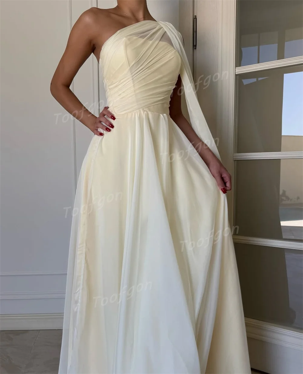 ชุดราตรีผู้หญิงสีเหลืองแบบไหล่เดียว ผ้าชีฟอง ดีไซน์หรูหรา จับจีบ สำหรับงานเลี้ยงอย่างเป็นทางการ ชุดราตรียาวสั่งตัดได้ สไตล์ซาอุดิอาระเบีย