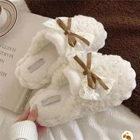 Chaussons d'hiver chauds en fourrure pour femmes, pantoufles à semelle épaisse, mignonnes avec nœud, antidérapantes, douces, chaussures d'intérieur en peluche pour femmes. 1