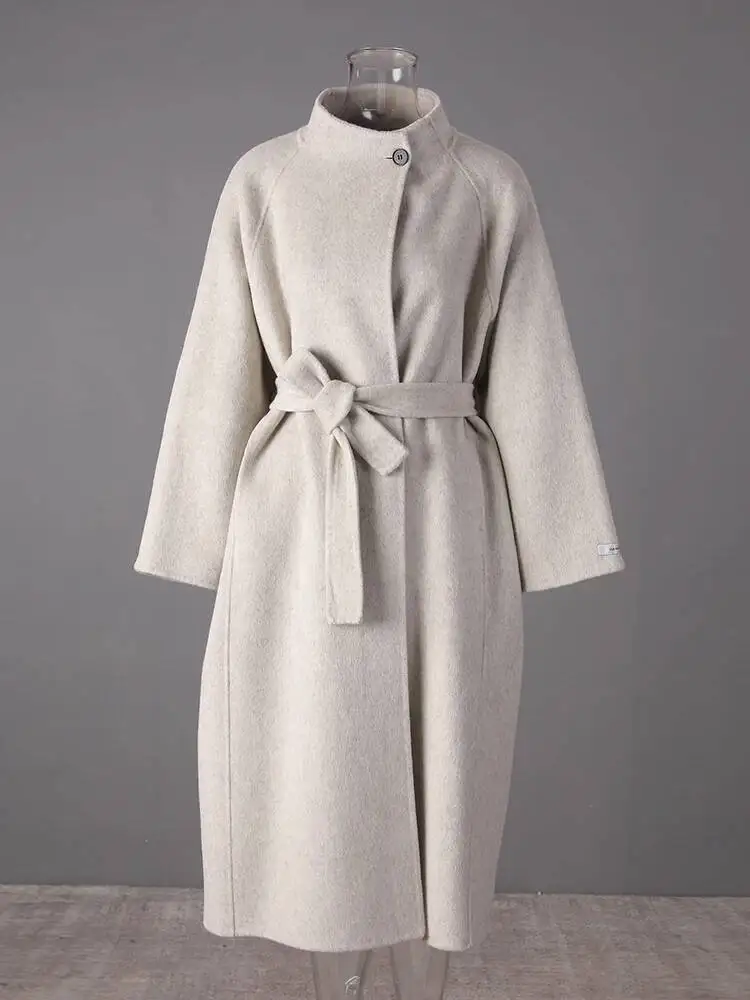 HUISONG Beige Belted Big Size Elegante Wollen Jas Nieuwe Stand Kraag Lange Mouw Vrouwen Jas Mode Tij Herfst Winter 2025