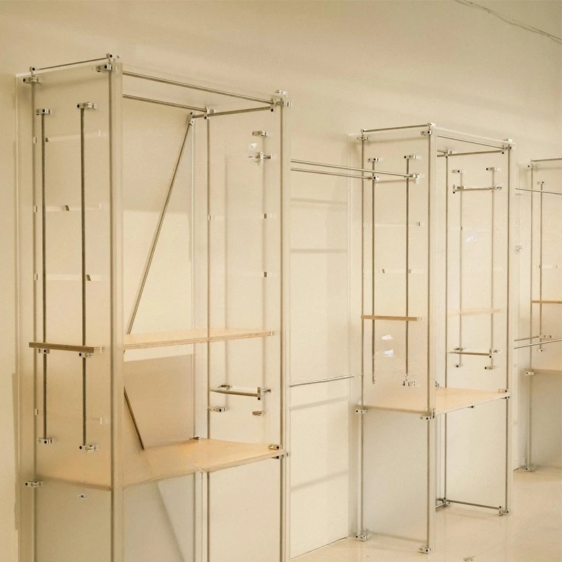 Rak pajang lantai toko pakaian baru yang kreatif, rak lantai papan laut sumbu optik, etalase tas sepatu akrilik