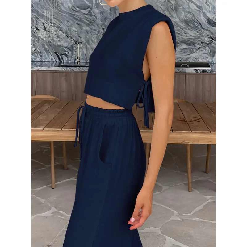 موضة القطن والكتان دعوى الملابس النسائية 2026 الربيع والصيف منصات الكتف الجديدة بلا أكمام بنطلون علوي قطعتين مجموعة