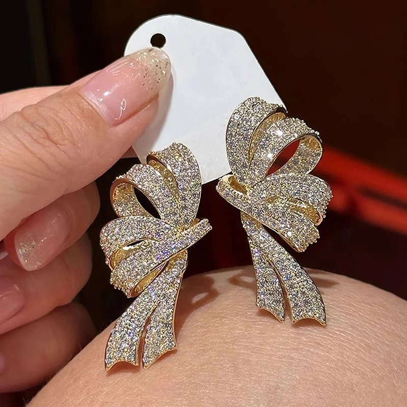 ZAKOL Luxuriöse Voll-Pavé-Zirkonia-Ohrstecker mit Schleifen-Design für Damen, Funkelnde CZ-Knoten-Hängeohrringe, Hochzeits- und Party-Schmuck – Detail 6
