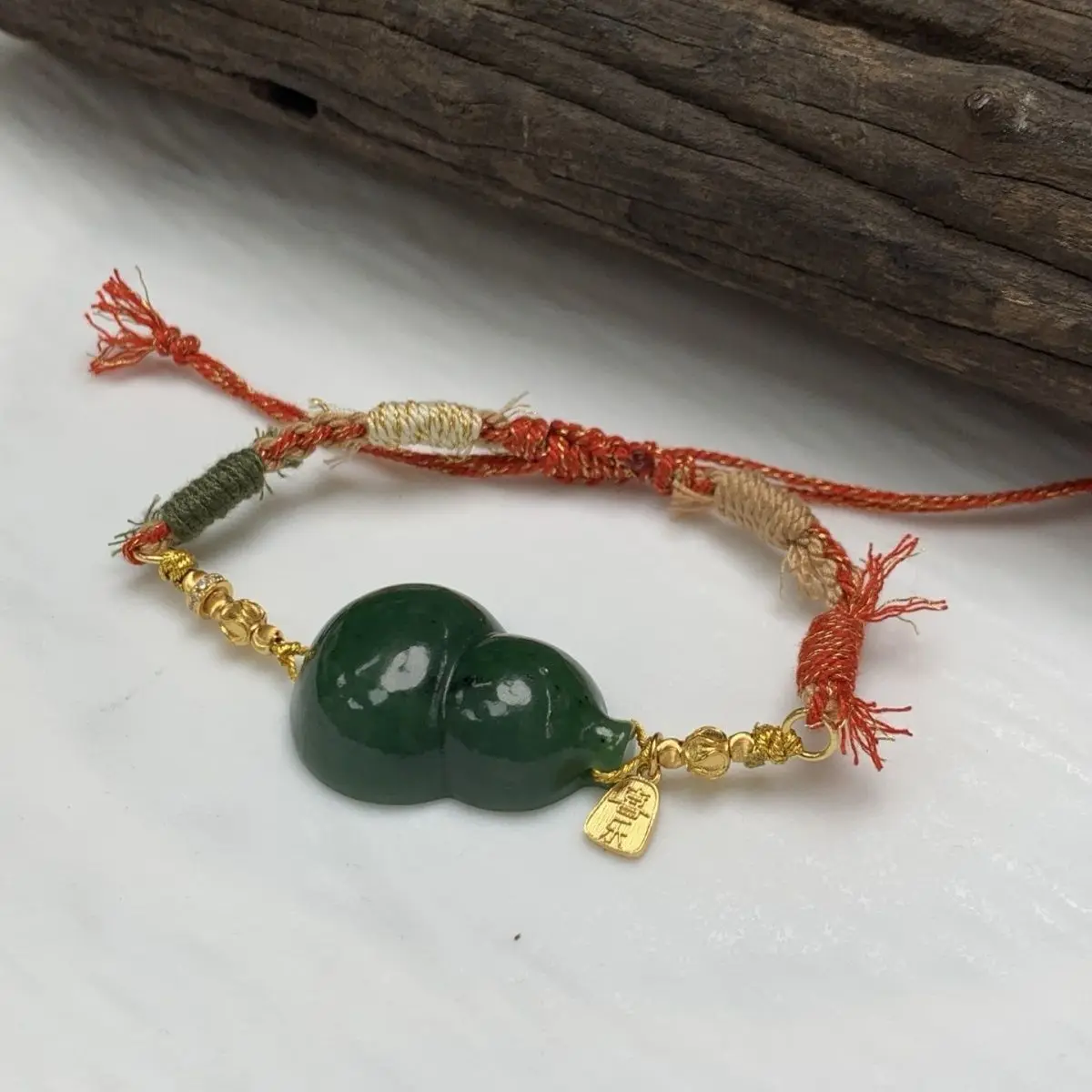 

Hetian jade natural Xinjiang gourd bracelet jasper bracelet woven hand rope lucky jade