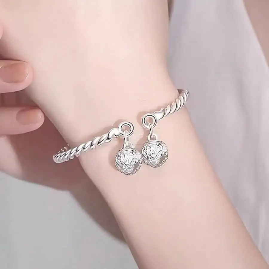 

Women's fashion bracelet with tribal bell charms, adjustable, unisex style, perfect as a party gift