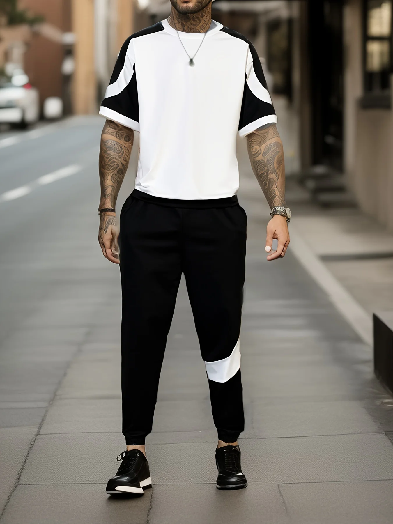 Street Casual Men's T-shirt Short-sleeved Suit And Pants Personalized Fashion Black And White Patchwork Color Sports And Leisure