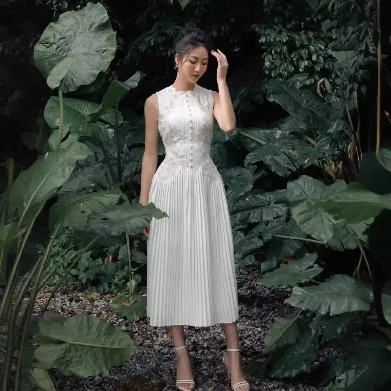 ファッション刺繍プリーツドレス女性のノースリーブかぎ針編みフラワー中空アウトステッチホワイトウエディングパーティーローブ Vestidos