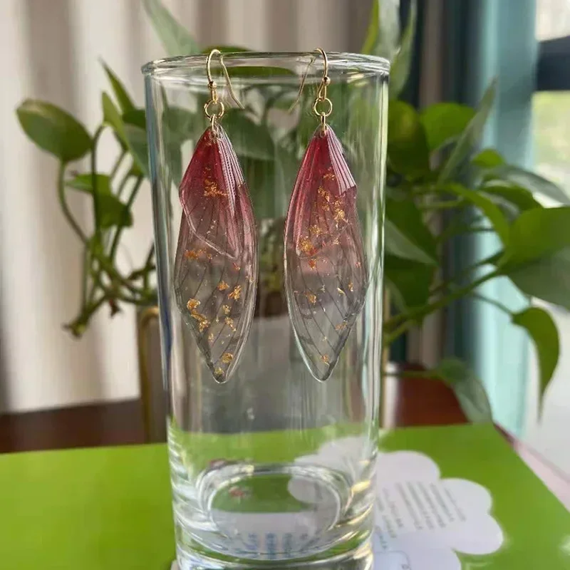 أقراط على شكل فراشة أقراط متدلية متدرجة اللون تصميم أجنحة الزيز مشبك أذن على شكل فراشة للنساء مجوهرات عصرية