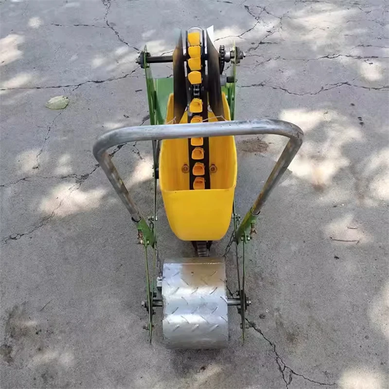 

New hand-pushed garlic planter Small household hand-pushed light and convenient single garlic planting machine