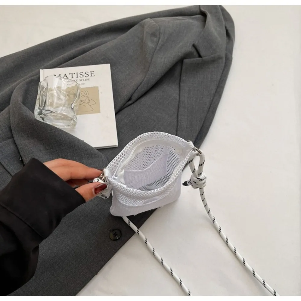 Portafoglio coreano alla moda in rete di nylon tinta unita borsa a tracolla per adolescenti borse a tracolla borsa per cellulare cava unisex