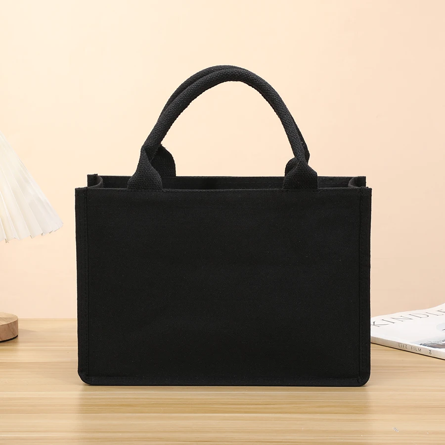 

Handheld tote bag - black for holding books, three-dimensional makeup, supermarket shopping bag, cloth bag