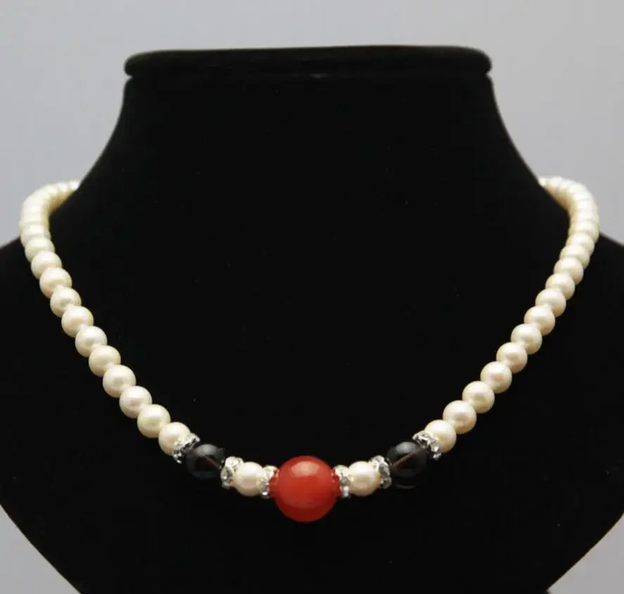 

Ожерелье из редкого белого пресноводного жемчуга диаметром 7–8 мм + черный кристаль