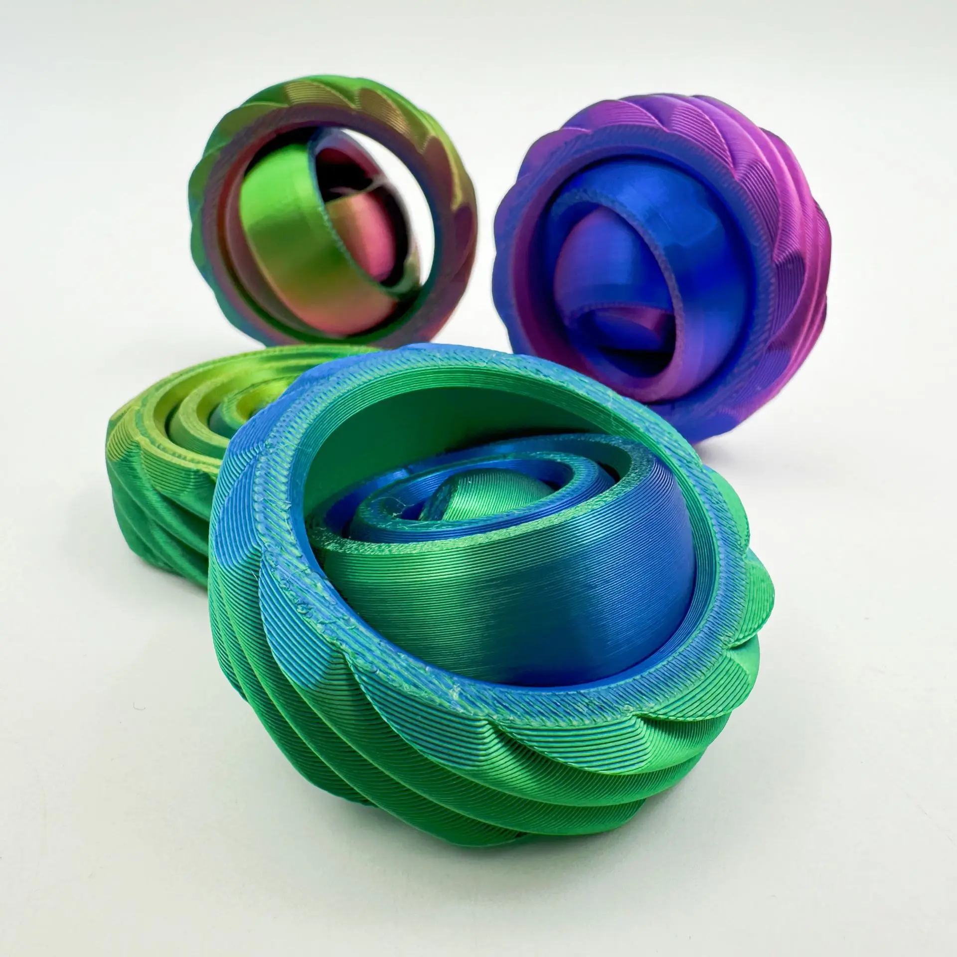 Cool 3D-geprint Spin Ball-speelgoed in kleurendoos O-vorm Universele Fidget Spinner Zwaartekracht Spin Verlicht angst Stress Relief Cool speelgoed