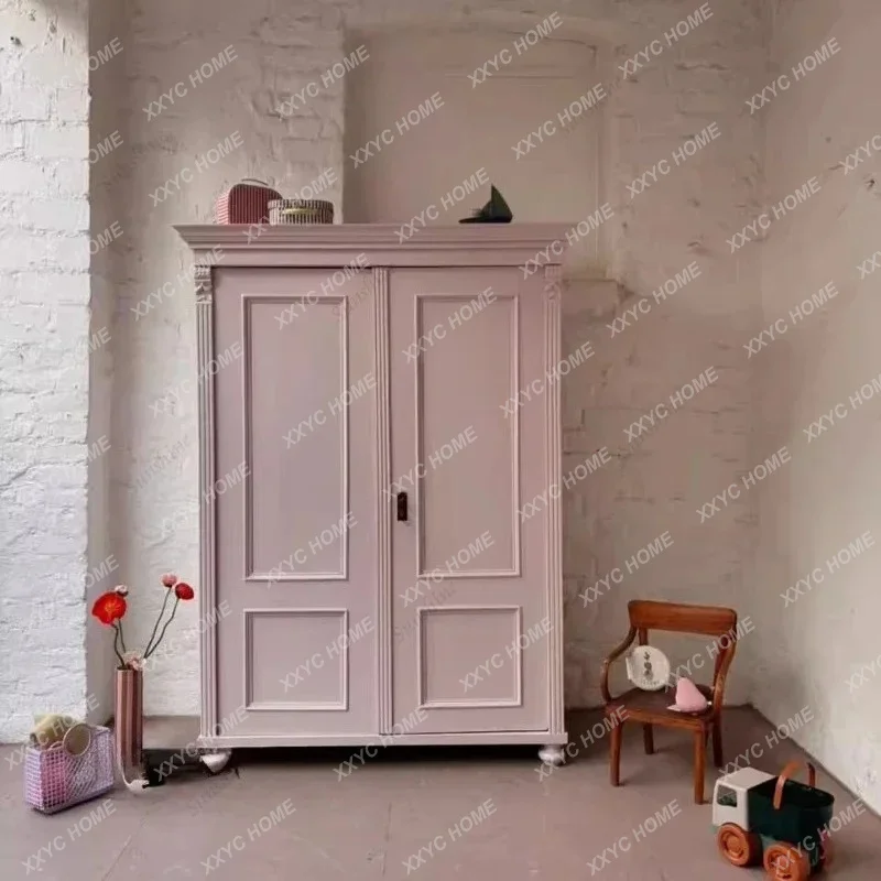 simple double door wardrobe with pink carved decoration Separate storage cabinet