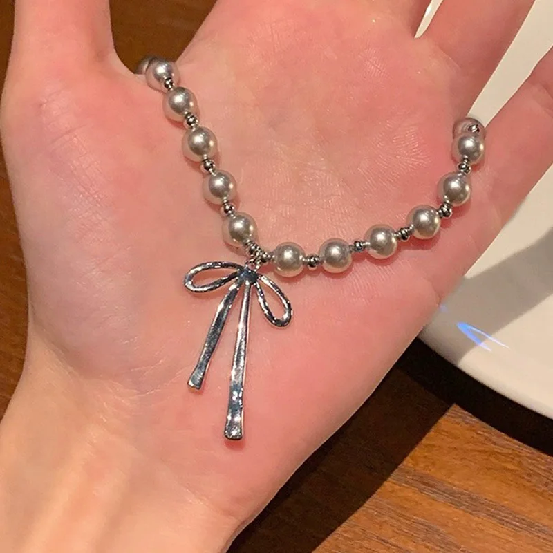 Goth Luxury Sliverสร้อยคอลูกปัดมุกY2K Harajukuความงามโบว์จี้สร้อยคอสําหรับหญิงชายChoker Coolเครื่องประดับ