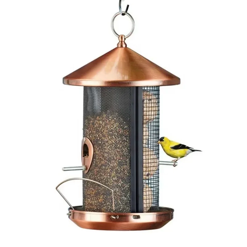 Copper hanging bird metal feeder with two feeding stations that can be used anywhere in the yard or garden