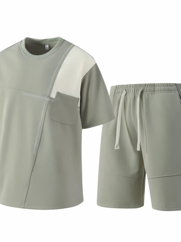 

Летний новый свободный повседневный спортивный костюм для мужчин: футболка с коротким рукавом и бриджи, комплект из двух предметов, полиэстер, молодежный стиль.