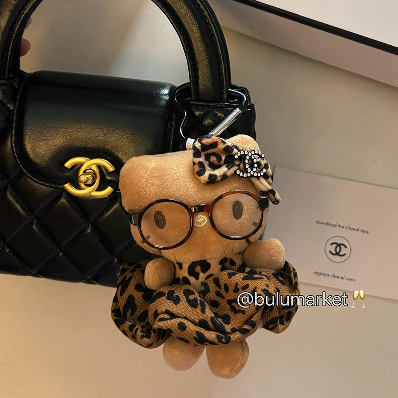 سانريو مرحبا كيتي الجلد الداكن أفخم المفاتيح Kawaii بلوشي محشوة اللعب دمية قلادة لحقيبة الظهر محفظة الفتيات حقيبة الملحقات
