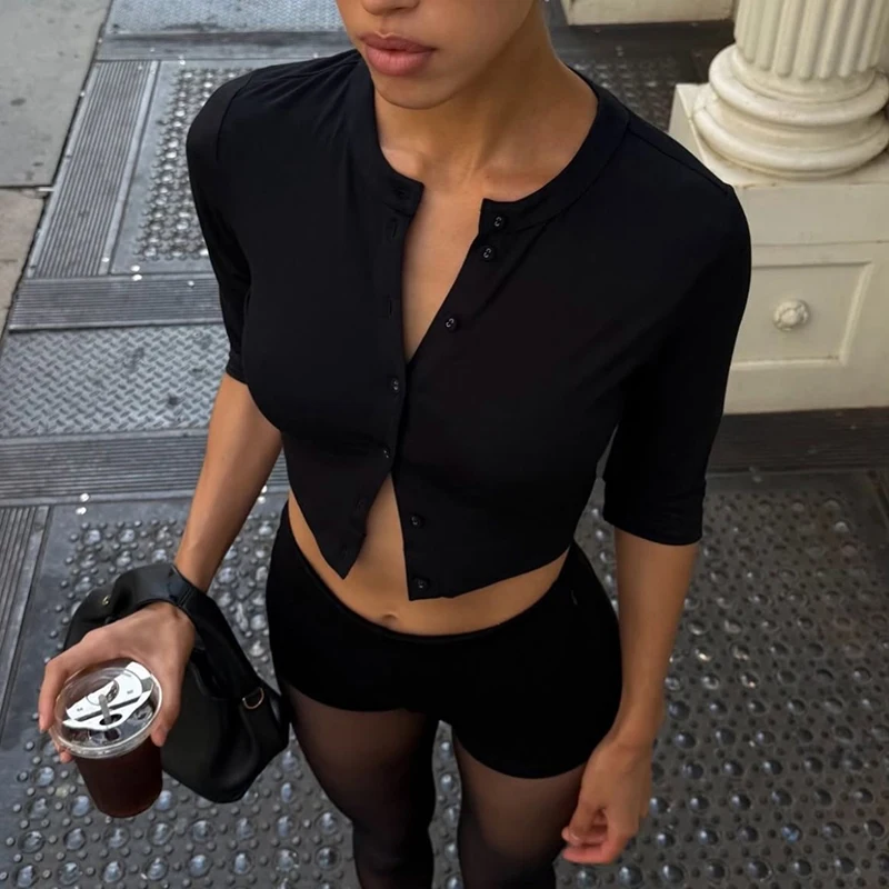 Simple and high-end solid color button up mid sleeve sexy and slimming top with a cinched waist and pullover