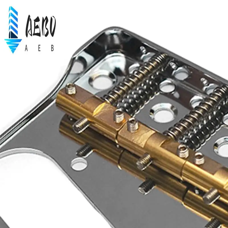 

AEB0-TL Кольцо звукоснимателя для гитары в стиле моста, металлический каркас с компенсационными латунными седлами, плоскими и отрезанными боками