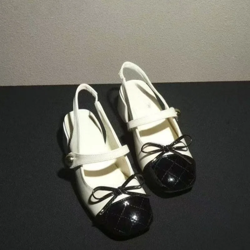 

Niche patent leather temperament rear empty single shoes women 2026 spring and summer Baotou block heel shoes