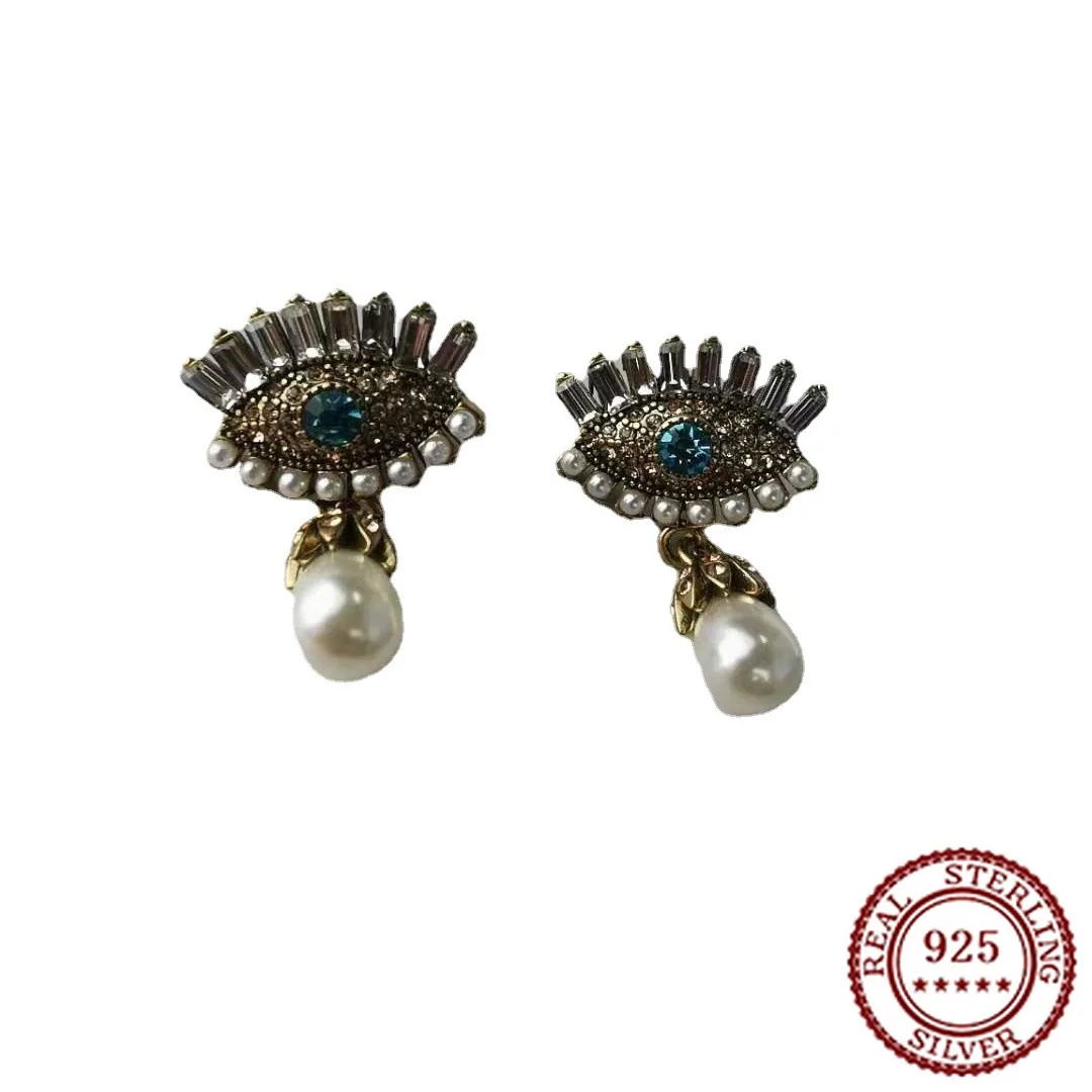 

2025 New Trendy Classic Full Diamond Eyes Pearl Earrings Devil's Eye Earrings Retro Punk Style Cool Earrings