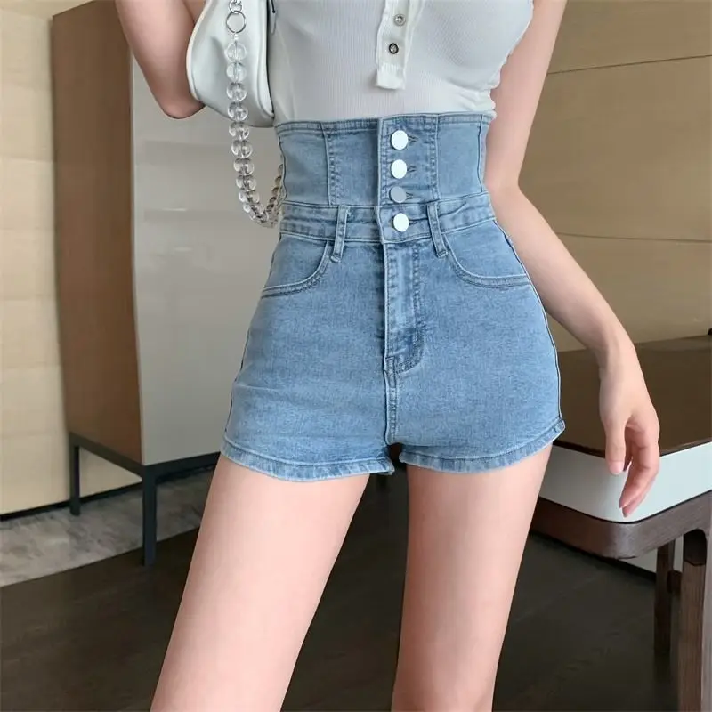 

Новые облегающие и узкие ноги и длинные джинсовые шорты. Однобортные однобортные шорты с очень высокой талией, подтягивающие характер.