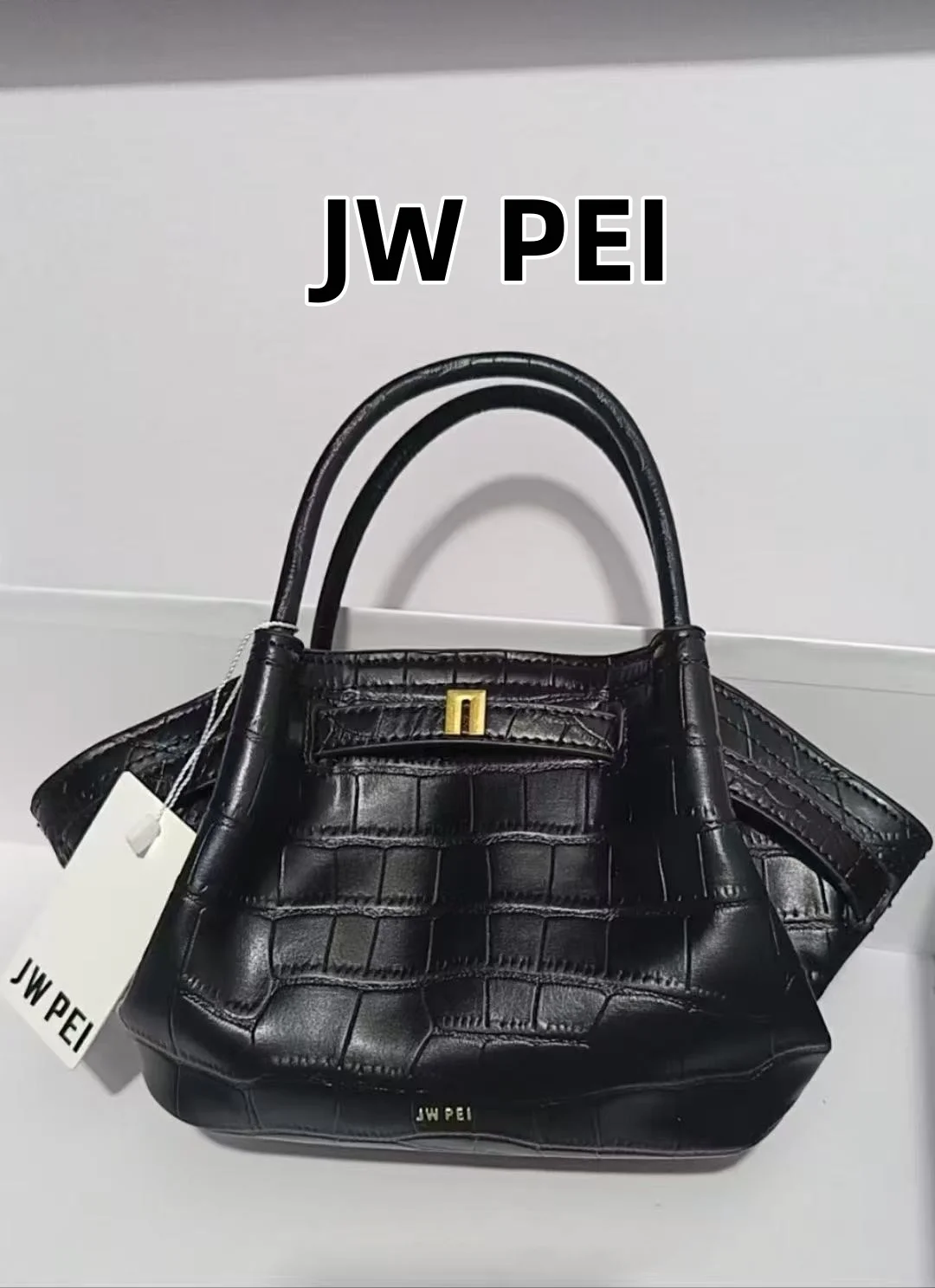 Jw Pei Handheld 202…