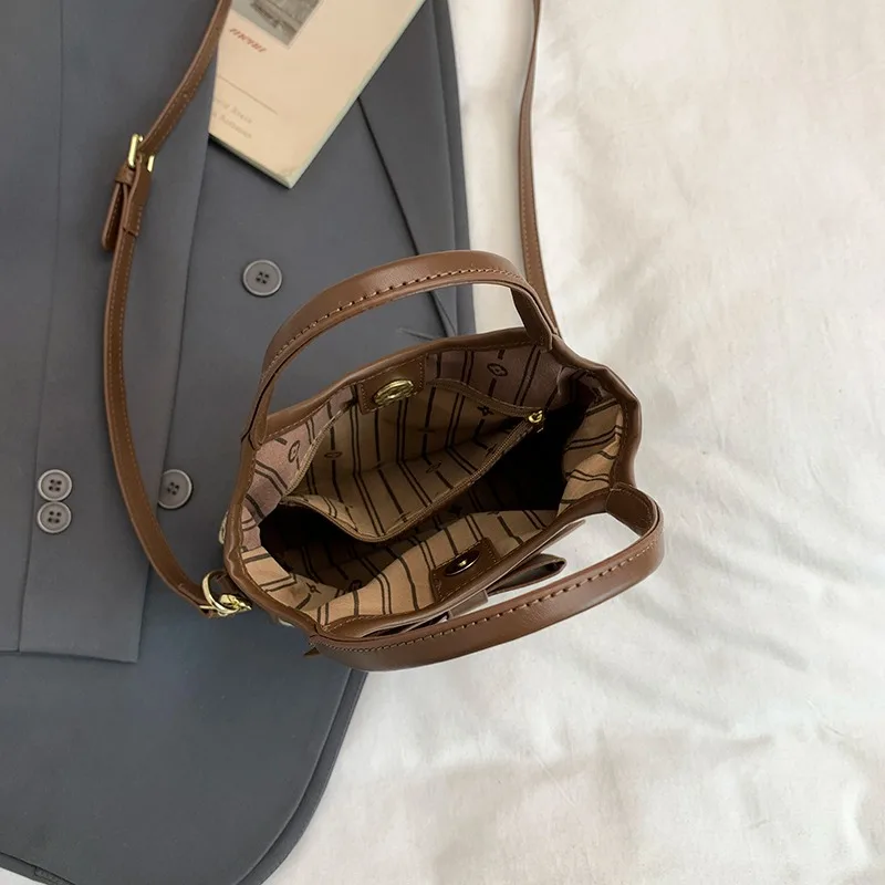 PU Hand-gehalten Bogen Eimer Tasche Trendy Mode Schulter Tasche Einfache Vielseitige frauen Tasche Pendler