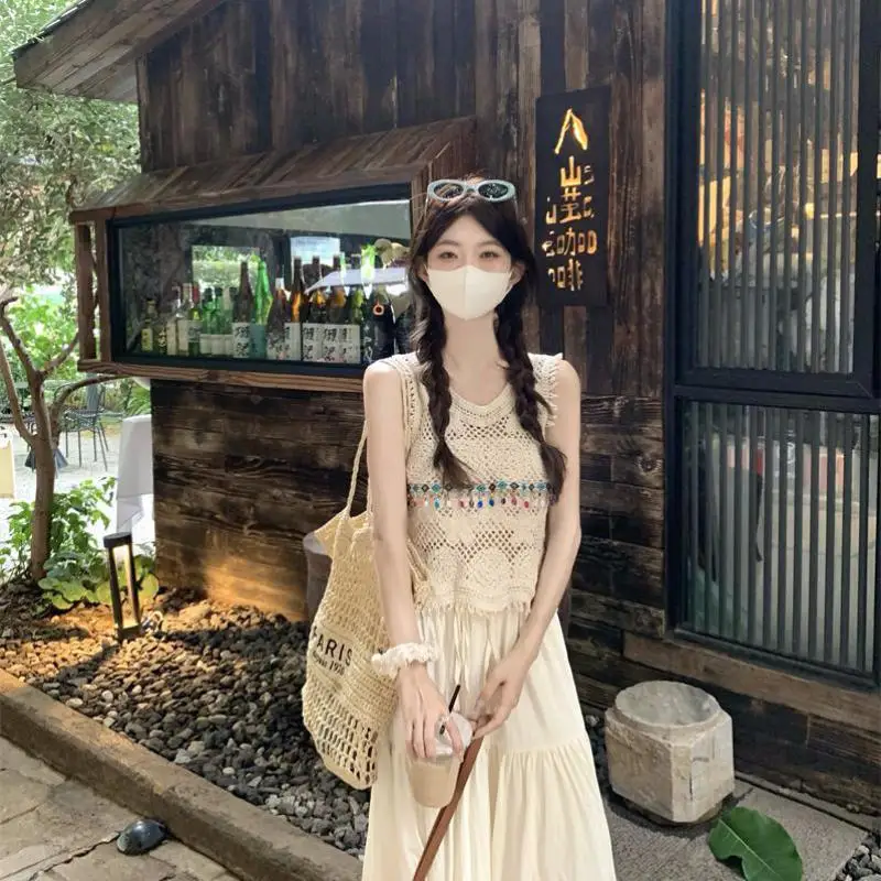 

Autumn Style Hanging Neck Strap Hollow Out Tassel Vest Women High Waist Versatile Large Swing Half Skirt Two-piece Set