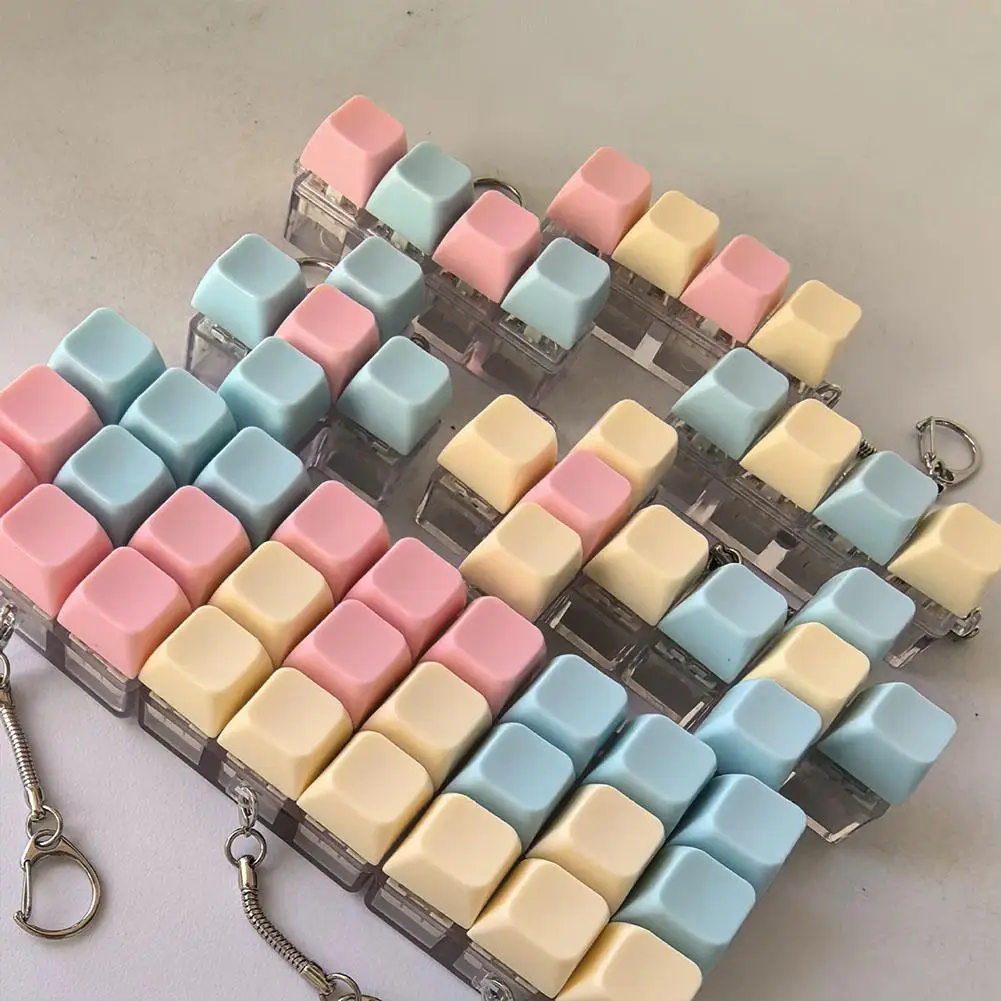 Juguetes coloridos para teclado para adultos y niños, llavero con clicker de teclado Pastel de 1/4/5/9 botones para el trabajo, alivio del estrés y la ansiedad