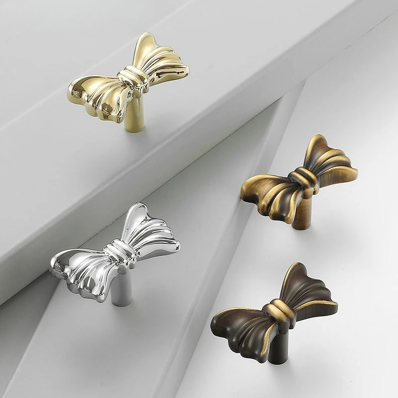 

Роскошные латунные ручки для шкафа Nordic Light с бантом - персонализированные золотые ручки с одним отверстием для современной гардероба, ящика, мебели