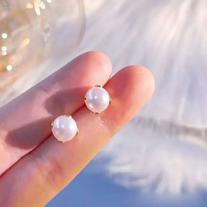 A pair of small earrings for women, round balls in gold and silver, multiple styles for multiple perforations, cute earrings mad