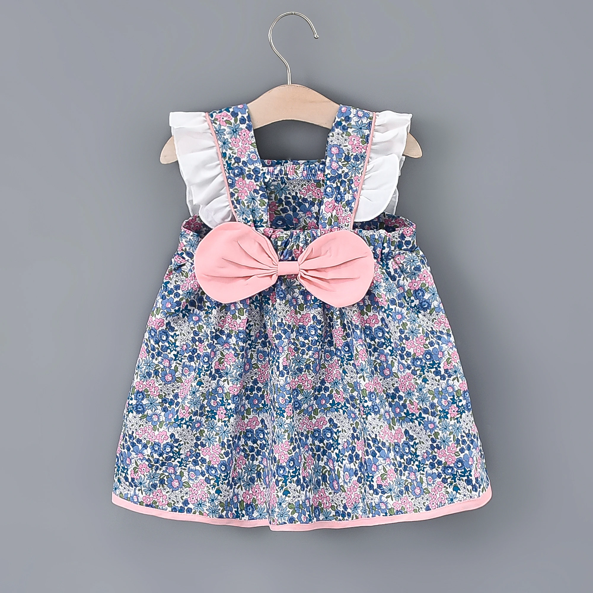 Baby Girls Floral Print Princess Dress With White Lace On The Sides And A Big Bow In The Back