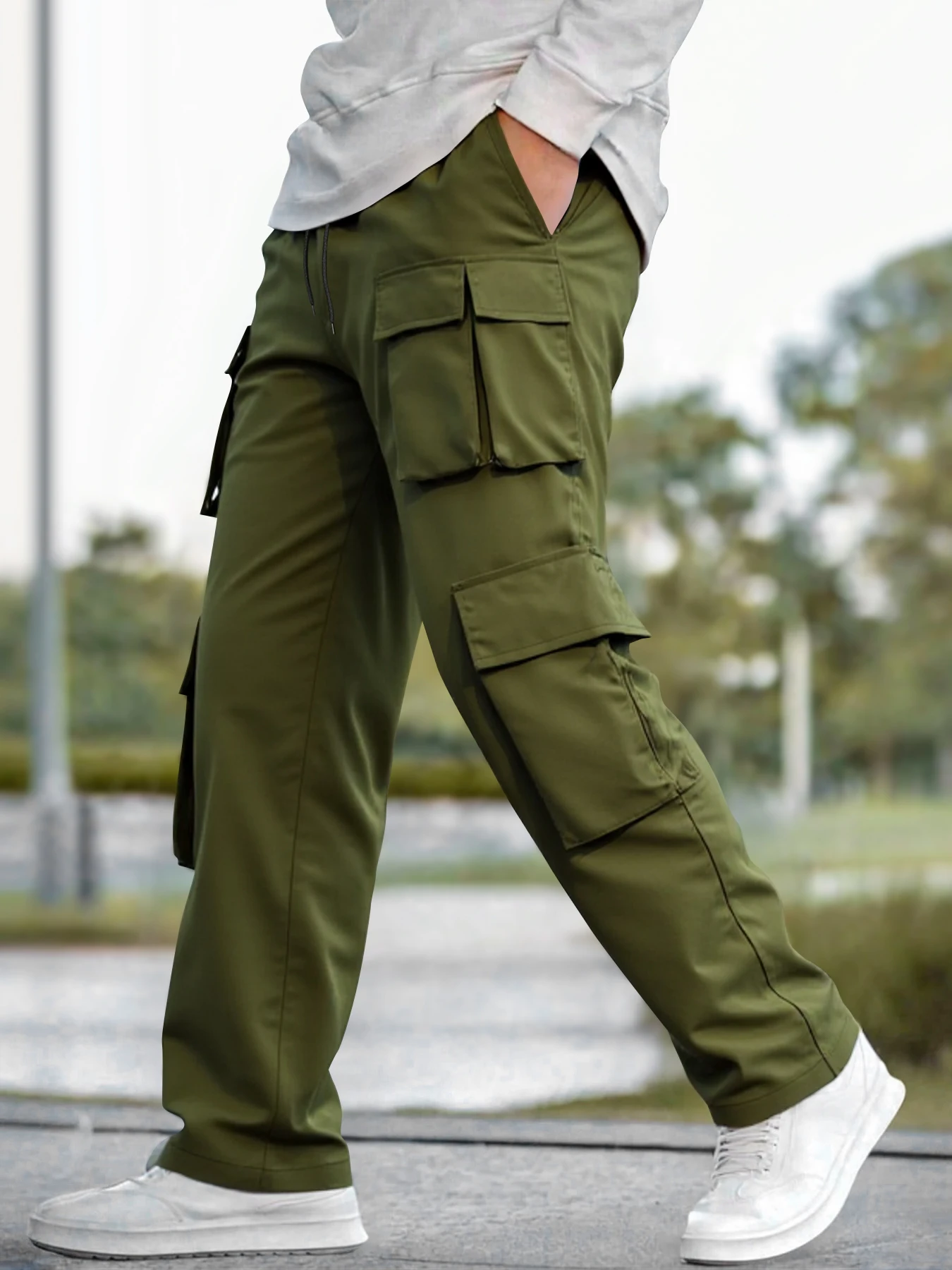 Premium men's work pants, multi-pocket design, suitable for all seasons, jogging pants style, perfect for outdoor activities.