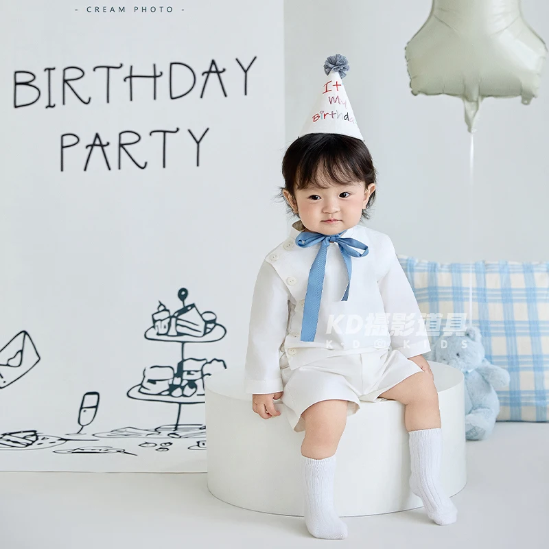 9-12M Vestito di compleanno per bambini e cappello da festa Costumi per fotografia neonato Cuscino a quadretti Peluche Decorazioni per scene di compleanno Prop