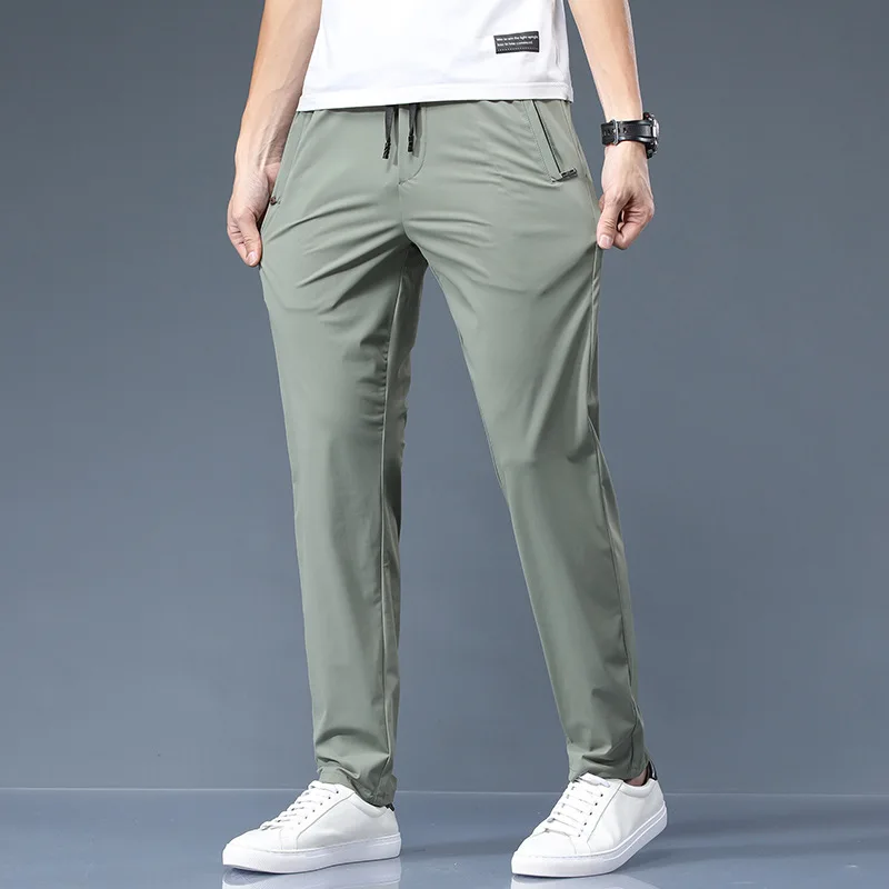 Pantaloni casual elastici da uomo in seta di ghiaccio pantaloni sottili versatili di moda aziendale pantaloni da uomo traspiranti ad asciugatura rapida