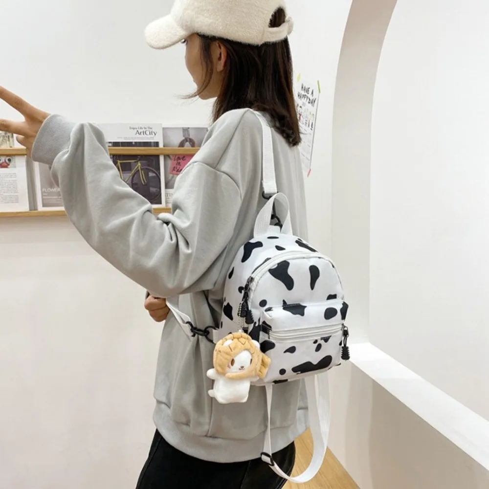 Sac à dos en toile avec sangle réglable pour femme, sac de voyage multifonction, mini sac à dos portable, tache de vache