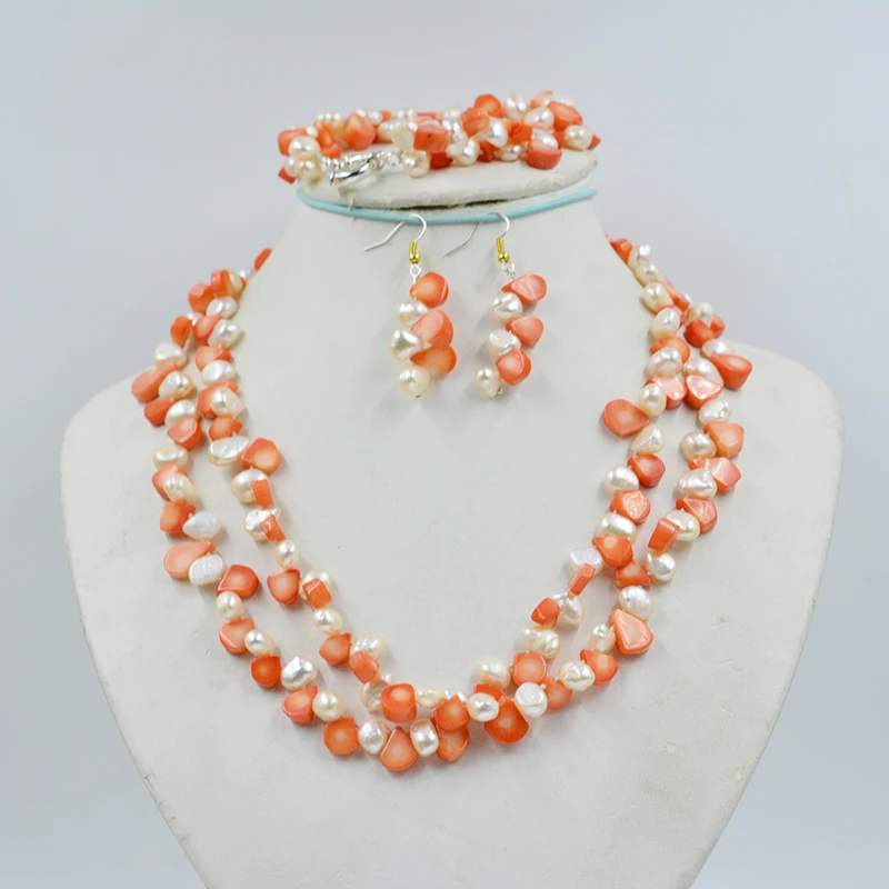 High quality women's wedding jewelry set. 9MM natural baroque pearls and orange coral. Necklace/Bracelet. earrings