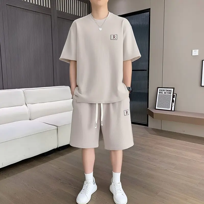 

Men's Casual Summer Outfit Set Loose Ventilated Korean T-Shirt Shorts Sporty Casual Wear 2026 New