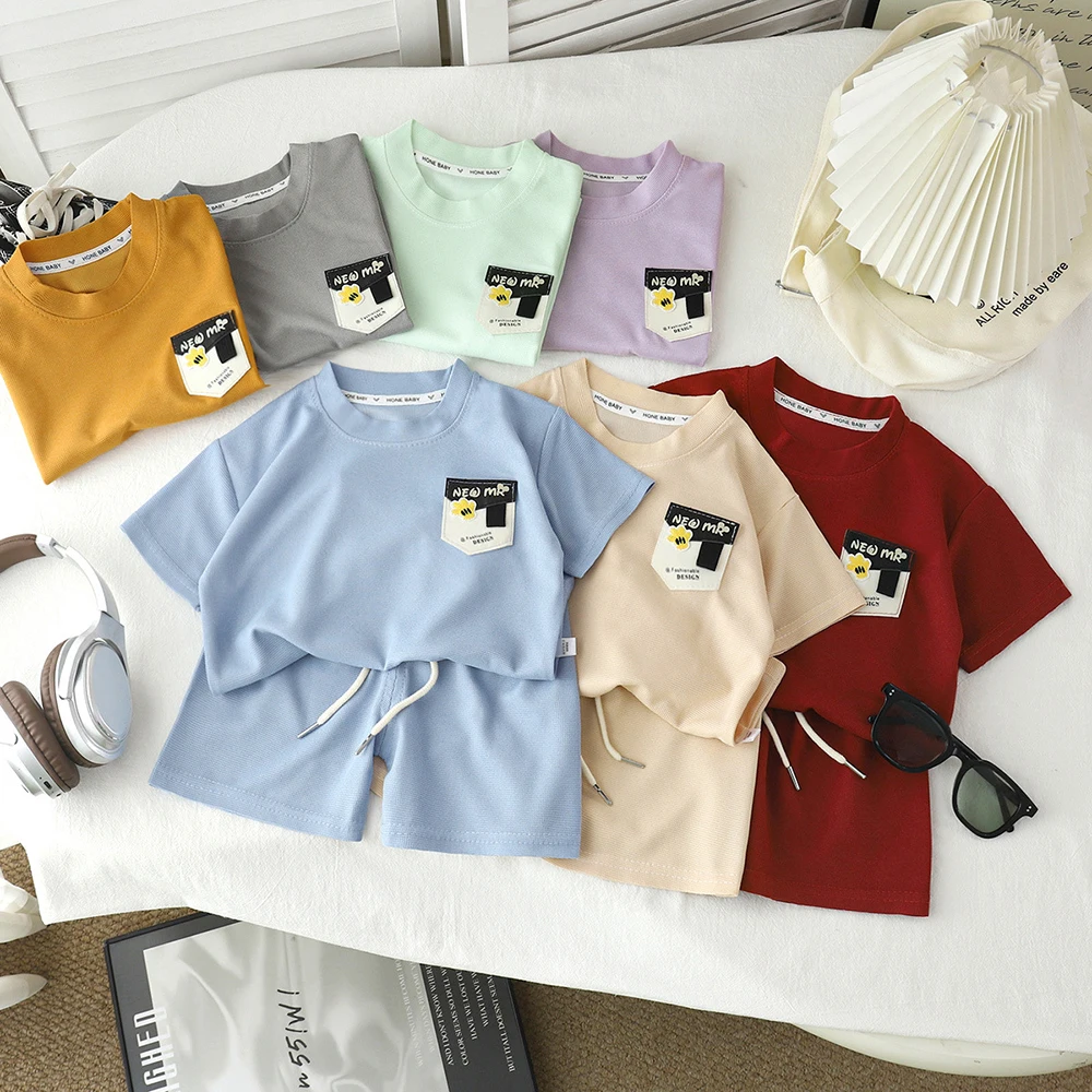 

Kids Boys Tracksuit Summer Girls Sports Outfit Casual Loose Solid Short Sleeve T-shirts+Shorts 2Pcs Children Clothes Sets 2026