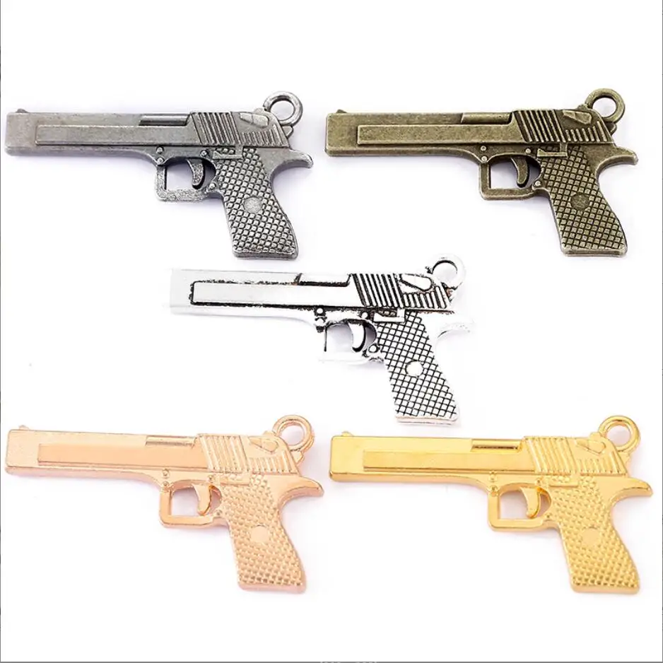 

100pcs 35*20mm Pistol Necklace Charm Golden Submachine Gun Pendant DIY Necklaces For Women And Men Fashion Jewelry F0136