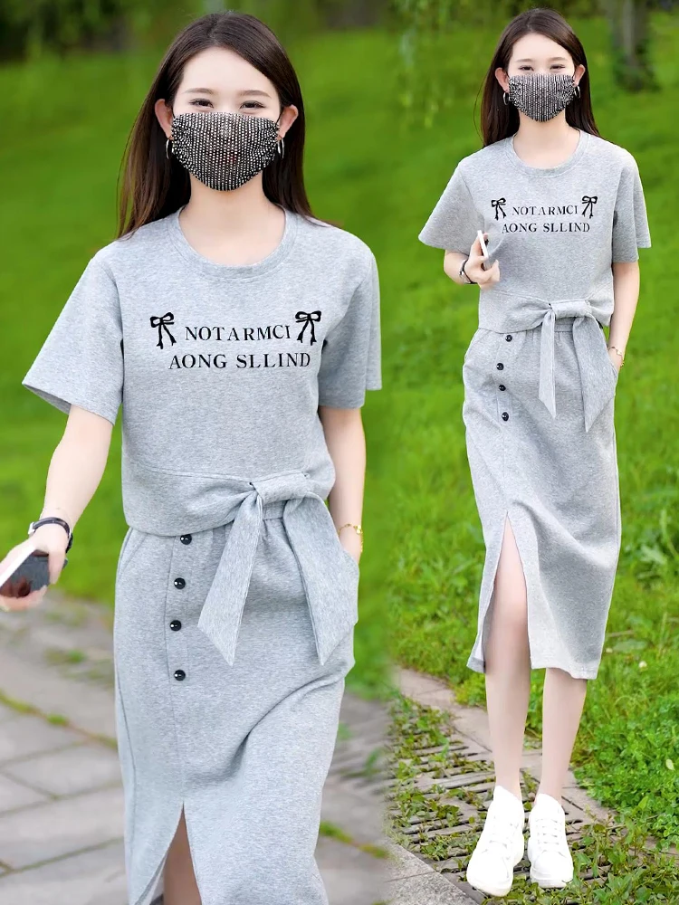 

Новый летний комплект повседневной спортивной одежды для женщин 2026: модный комплект из двух предметов с укороченным топом и юбкой с разрезом