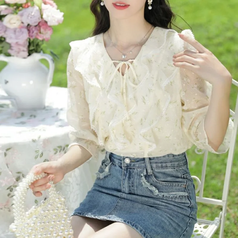 2023 New Summer Fashion French Floral 7/4 Sleeve V-neck Lace Up Ruffle Hem Loose Casual Sweet Age Reducing Women\'s Shirt