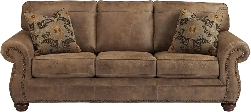 Larkinhurst Faux Leather Sofa with Nailhead Trim and 2 Accent Pillows, Brown